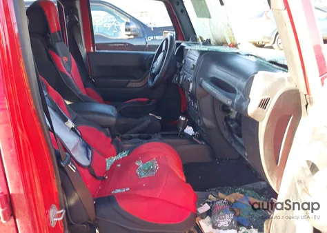 2011 Jeep Wrangler Unlimited Sport z USA, uszkodzony, nr VIN 1J4BA3H16BL583349